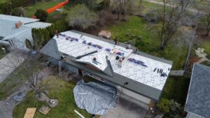 drone aerial footage of a roof replacement in process by Western Montana Roofing